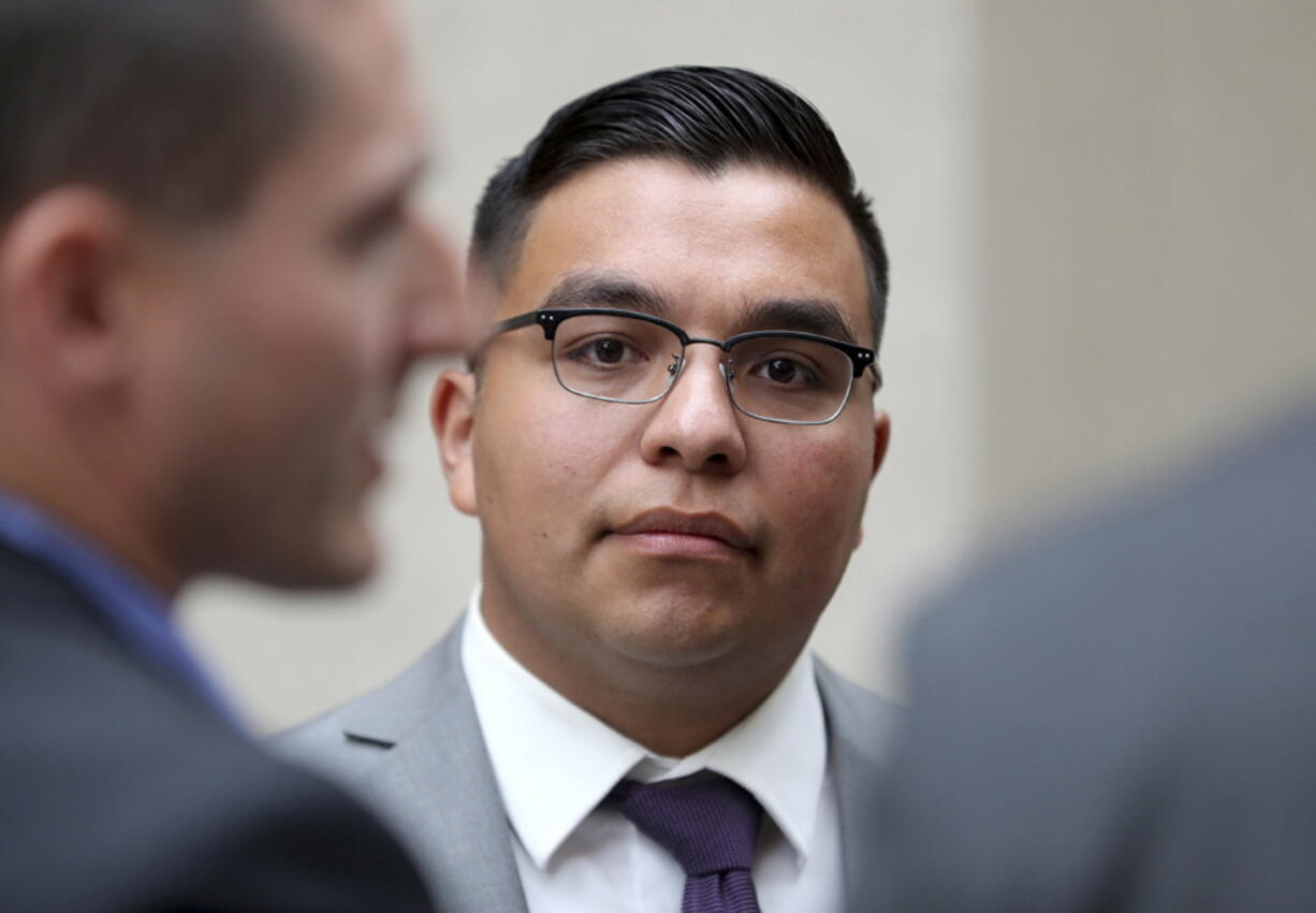 St. Anthony, Minn., police officer Jeronimo Yanez stands outside the Ramsey County Courthouse Tuesday in St. Paul, Minn.