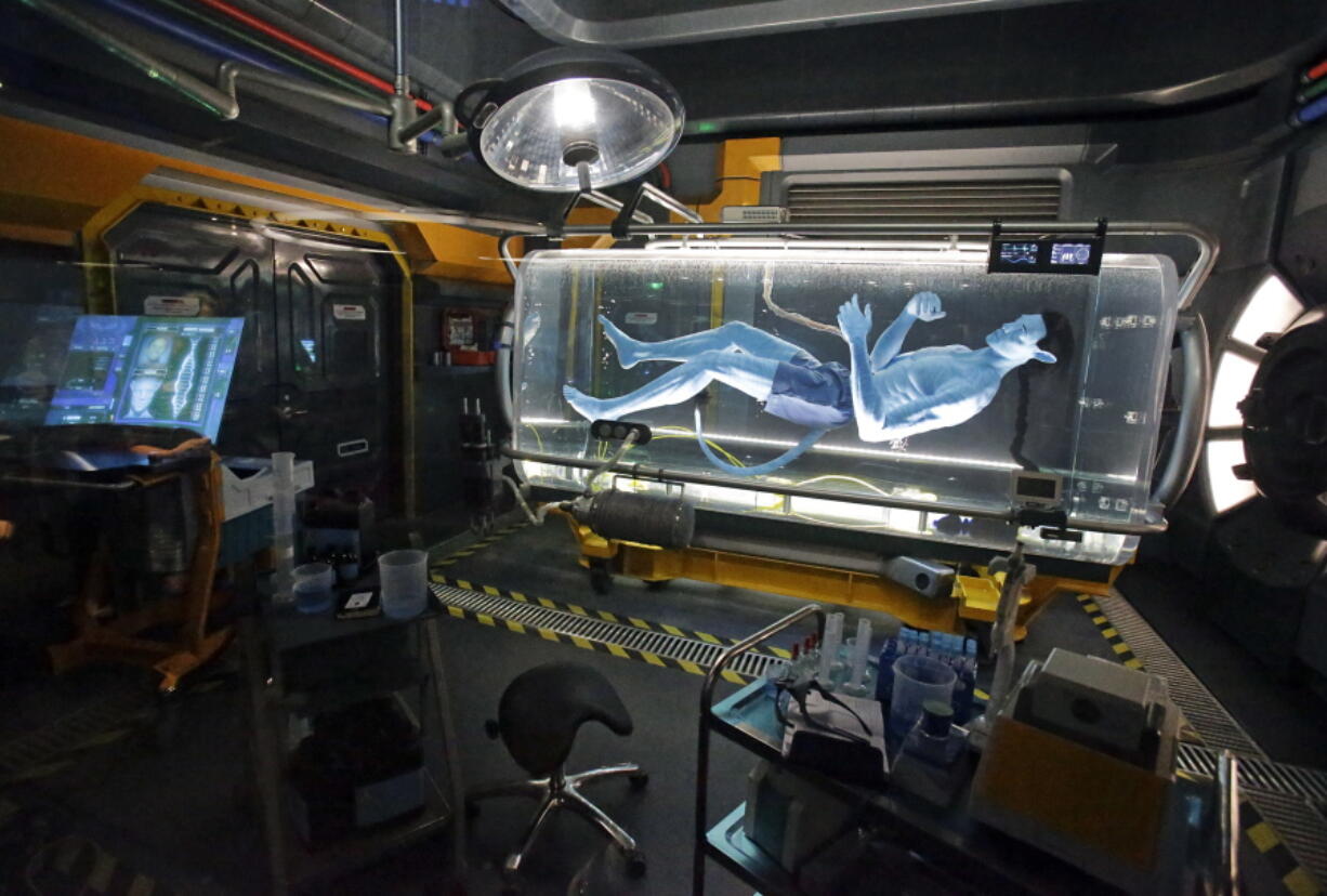 John Raoux/Associated Press
A Na’vi in a science lab while in the queue for the Avatar Flight of Passage ride at “Pandora —World of Avatar” land attraction in Disney’s Animal Kingdom theme park at Walt Disney World in Lake Buena Vista, Fla.