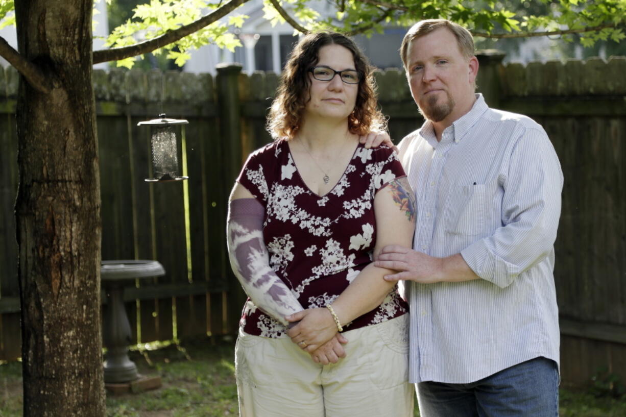 Lisa Dammert and her husband, Patrick, pose at their home in Franklin, Tenn. As a thyroid cancer survivor battling nerve damage and other complications, Lisa was in such dire financial straits in 2014 that she and her husband let their health insurance lapse, putting them in a category with some 6 million Americans who have gone without coverage at times despite serious health problems. That group and millions of others who have had a gap in insurance could face higher charges under the Republican health care bill that recently passed the House.