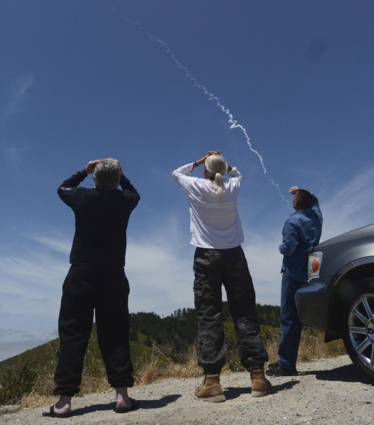 From Harris Grade Road north of Lompoc, Calif., spectators watch an interceptor missile launch from an underground silo at Vandenberg Air Force Base, and fly toward an intercontinental-range missile fired from a test range on Kwajalein Atoll in the Pacific. Hit or miss, the Pentagon’s attempt on Tuesday to shoot down a mock warhead over the Pacific Ocean marks an important milestone for an oft-criticized defense program that could be what stands between an incoming North Korean strike and the United States.