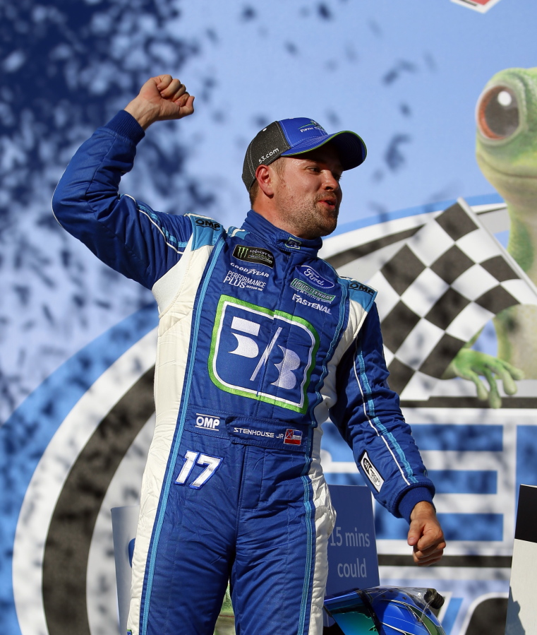 Ricky Stenhouse Jr. (17) celebrates after winning the Camping World 500 auto race at Talladega Superspeedway, Sunday, May 7, 2017, in Talladega, Ala.