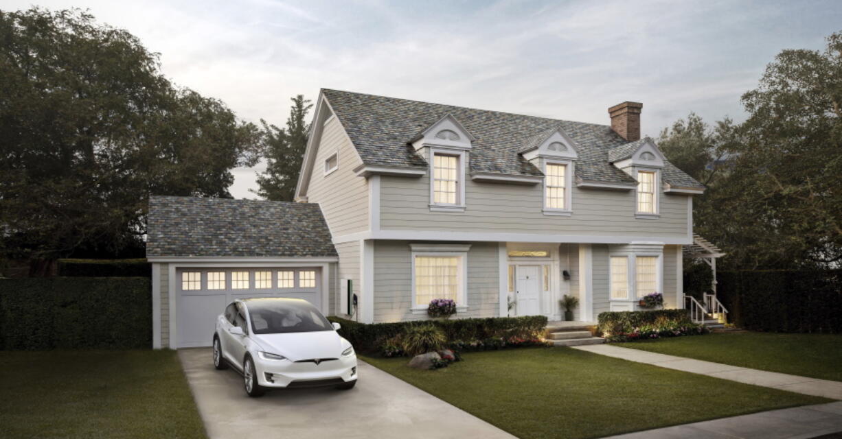 Tesla
A house with Tesla’s new slate solar roof tiles.