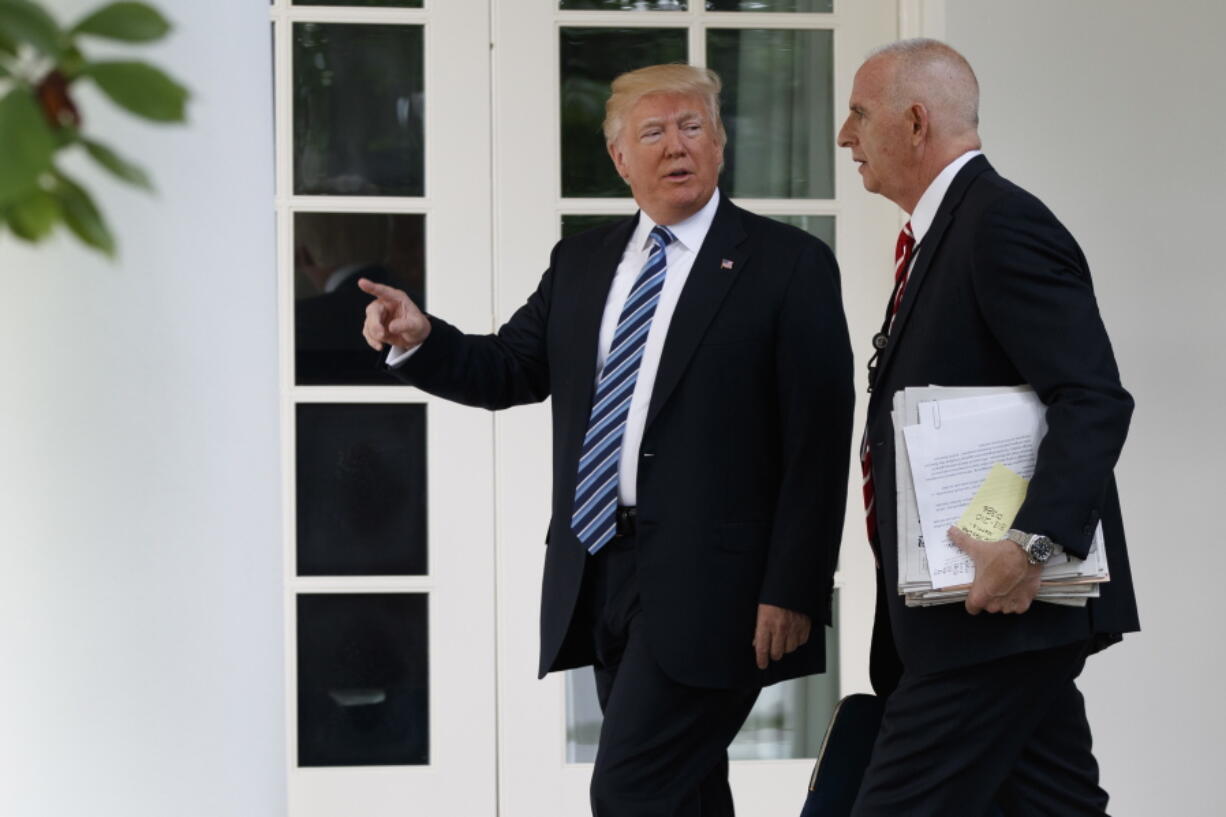 President Donald Trump walks with aide Keith Schiller to the Oval Office of the White House in Washington, Tuesday, May 2, 2017. President Donald Trump says the nation &quot;needs a good `shutdown&#039; in September&quot; to fix a &quot;mess&quot; in the Senate, saying on Twitter that the country needs to &quot;either elect more Republican Senators in 2018 or change the rules now to 51 (percent),&quot; suggesting more rules changes ahead in the Senate.