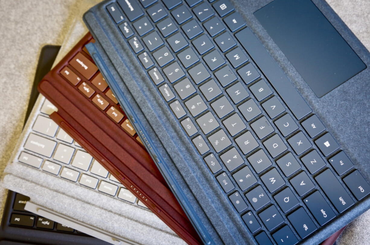 A selection of keyboards in four different colors for Microsoft’s new Surface Pro laptop-tablet hybrid, on display in New York.