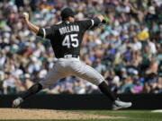 Chicago White Sox starting pitcher Derek Holland throws against the Seattle Mariners in the eighth inning of a baseball game, Sunday, May 21, 2017, in Seattle. (AP Photo/Ted S.