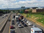 Traffic is diverted off I-5 onto Highway 14 because the bridge was closed by police for a man threatening to jump.