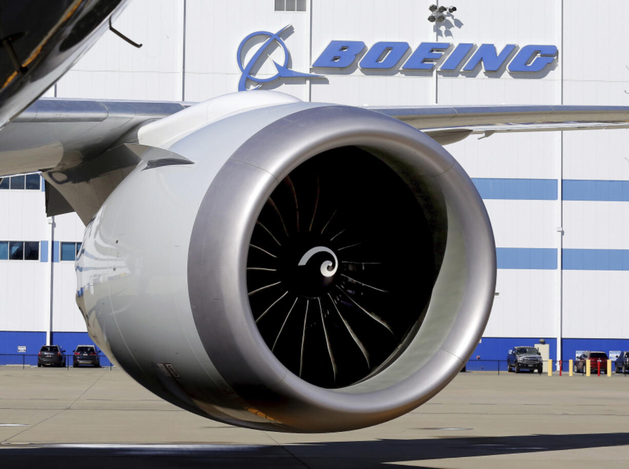 An engine and part of a wing from the 100th 787 Dreamliner to be built at Boeing of South Carolina’s North Charleston, S.C., facility are seen in February 2016 outside the plant. The World Trade Organization on Friday ruled that the U.S. has suitably addressed all but one piece of the European Union’s case alleging that Boeing receives illegal subsidies.