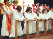 Bishop Sally Dyck commissions the Rev. M Barclay on Sunday. Courtesy of Rev. Britt Cox.