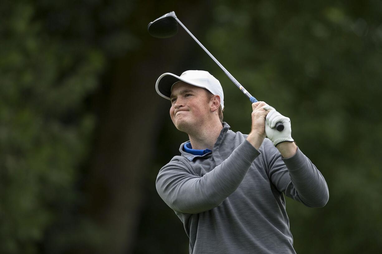 Camas High School graduate Brian Humphreys tees off on the second hole at Royal Oaks Country Club on Friday afternoon, June 9, 2017.