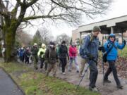 The Forever Young Hikers of Vancouver, led by Geoff Fowler, right, take an urban hike through Northwest Portland in December 2015. The group is tailored to those 50 and older and consistently has waiting lists for its outings.