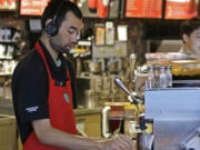 Barista Jay Rapp prepares an Eggnog Latte at a Starbucks store Nov. 24, 2014, in Seattle. Ted S.