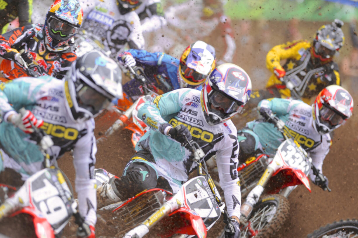 Eli Tomac (17) center, races in the 250 class at the 2013 Lucas Oil Pro Motocross Championships in Washougal.