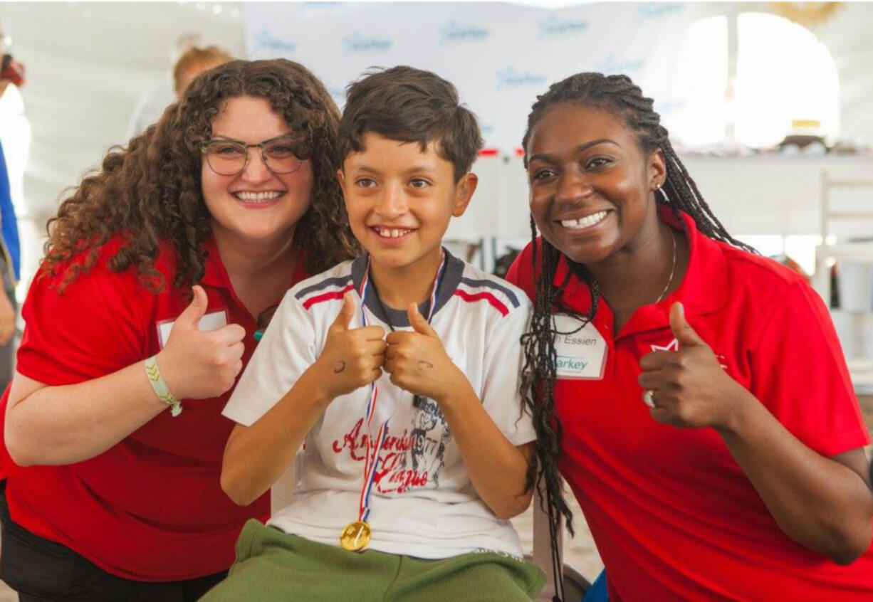 Fircrest: Lisa Batterton, left, an audiologist at Audigy Group, a patient and Latasha Jackson, right, a finance manager at Audigy Group on a trip with the Starkey Hearing Foundation to Mexico, where they served more than 900 children and adults with hearing loss.