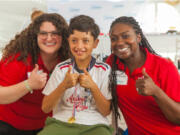 Fircrest: Lisa Batterton, left, an audiologist at Audigy Group, a patient and Latasha Jackson, right, a finance manager at Audigy Group on a trip with the Starkey Hearing Foundation to Mexico, where they served more than 900 children and adults with hearing loss.