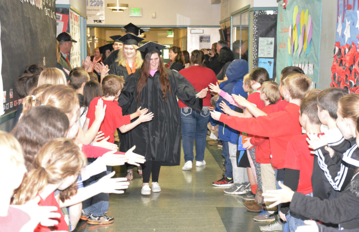 Washougal: Washougal High School graduating seniors participating in the first Senior Promenade, visiting former teachers and inspiring younger students.