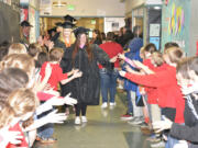 Washougal: Washougal High School graduating seniors participating in the first Senior Promenade, visiting former teachers and inspiring younger students.