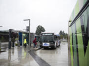 Passengers board a bus the Southside Vancouver Mall Transit Center on Thursday afternoon. The station serves The Vine as well as several other fixed routes including the 32, 7, 72, 73, 74, 78 and 80.