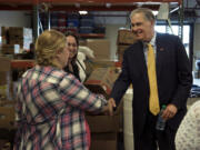 Gov. Jay Inslee met with staff of Share, a homeless service provider, in Southwest Washington on Friday. The governor is championing measures to help maintain funding for Share in the state’s budget. Inslee made several other stops while in town, including at the Washington State School for the Blind, where he made remarks during the commencement ceremony.