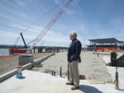 Barry Cain, owner of Gramor Development, at The Waterfront Vancouver during ongoing construction. Cain, his company and the city of Vancouver spent more than a decade working to break ground on the 21-block development.