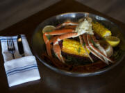 The crab boil served with corn on the cob, roasted potatoes, andouille sausage, cornbread and honey-cayenne butter at Line & Lure Seafood Kitchen and Tap in the Ilani Casino Resort near La Center.