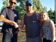 Battle Ground: Legendary pro skater Tony Hawk, left, stopped by the Battle Ground Skate Park last month to film a movie segment, and was welcomed to the area by City Councilor Brian Munson and his daughter Ashlyn Munson.