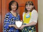 Bennington: Columbia Valley Elementary School fifth-grader Journey Mohn, left, with Janet Ray, of AAA Washington, receiving her award inducting her into the AAA School Safety Patrol Hall of Fame.