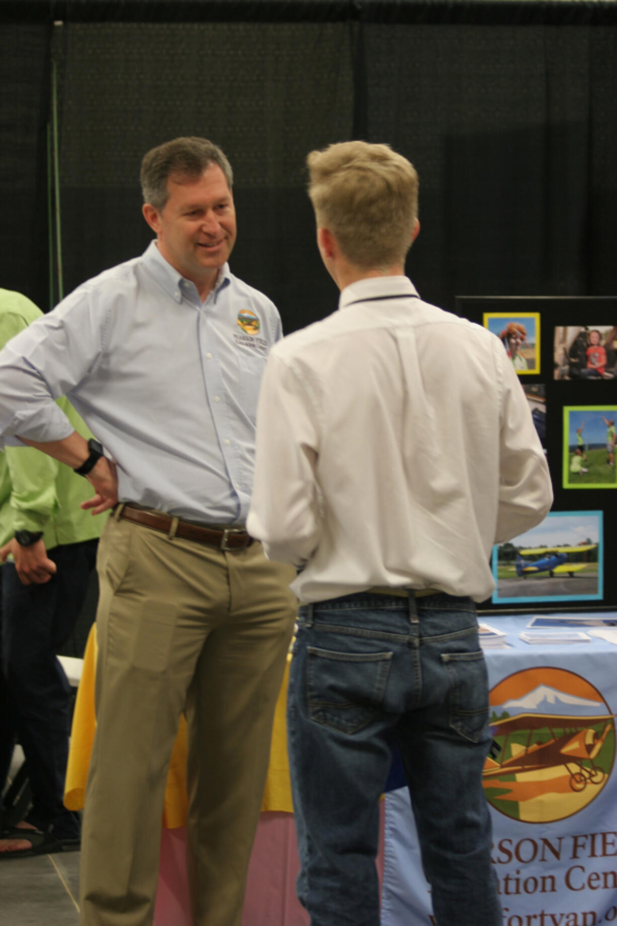 Ridgefield: A representative from the Pearson Field Education Center talks to a student at a Youth Employment Summit at the Clark County Event Center at the Fairgrounds on May 23, where teenagers learned about summer employment options, practiced mock interviews and applied for jobs.