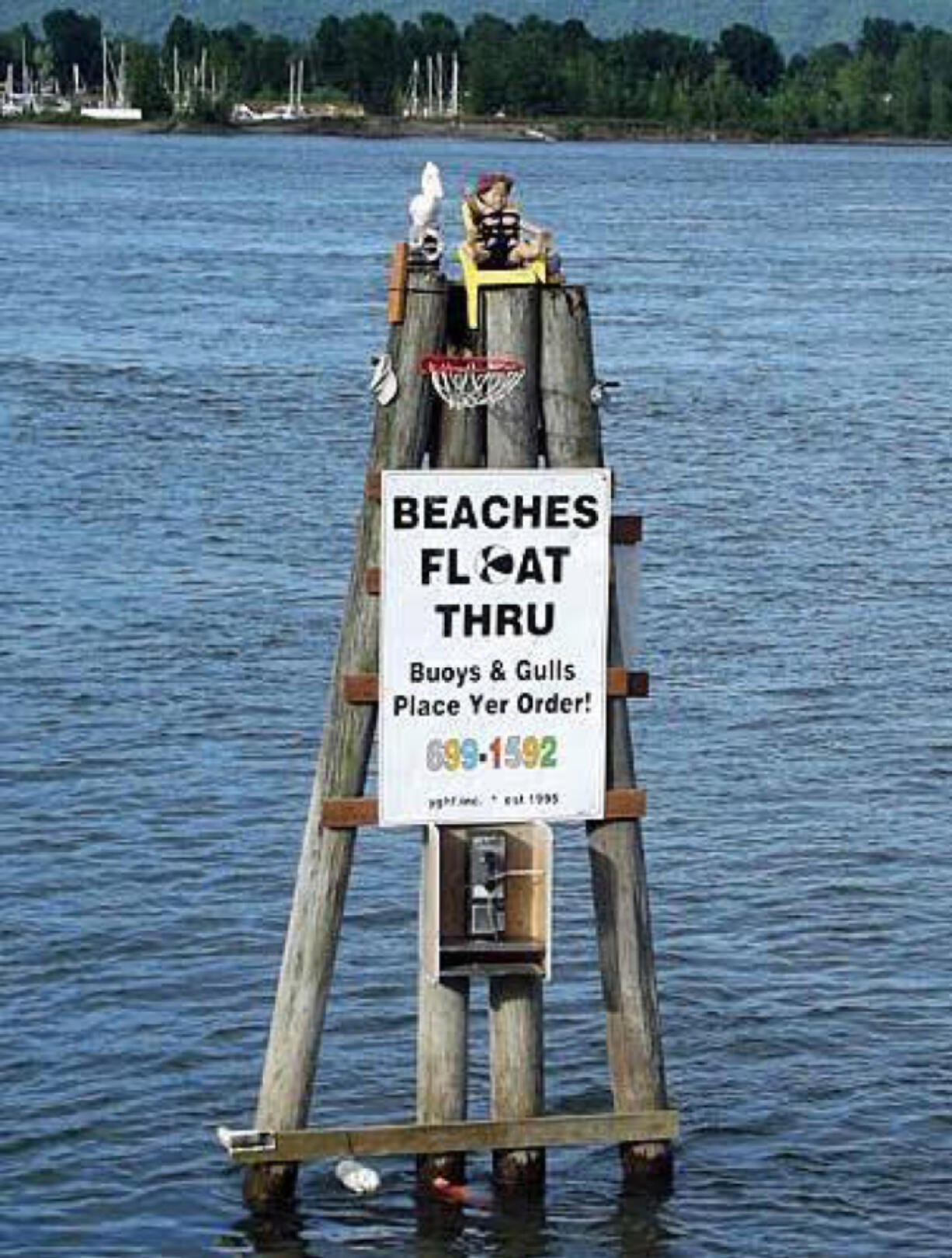 The sign for Beaches Restaurant and Lounge floated away sometime last Wednesday, its owner said. The restaurant is offering dinner for 20 to the person who retrieves it.