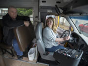 Rodney McKnight, Educational Service District 112 regional transportation coordinator, joins Jenny Bullard, director of specialized transportation, aboard a specialized school bus near district offices on June 16. The district failed 44.83 percent of bus inspections last summer due to since-fixed GPS devices that were improperly hung.