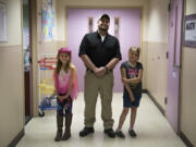 Hockinson Heights Elementary School’s Makena Nelson, from left, Tucker Cendana and Kaylin Oliver teamed up to help a choking student during lunch last month.