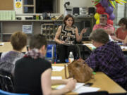 Michelle Beardshear of Vancouver leads the East Mill Plain Neighborhood Association meeting recently. After noticing that her neighborhood was declining, Beardshear took charge in creating the neighborhood association, which was recognized earlier this month by the Vancouver City Council as the 67th city neighborhood association.