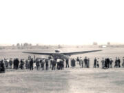 Onlookers gather at Pearson Field to see the ANT-25 flown by Valery Chkalov which landed in Vancouver on June 20, 1937.