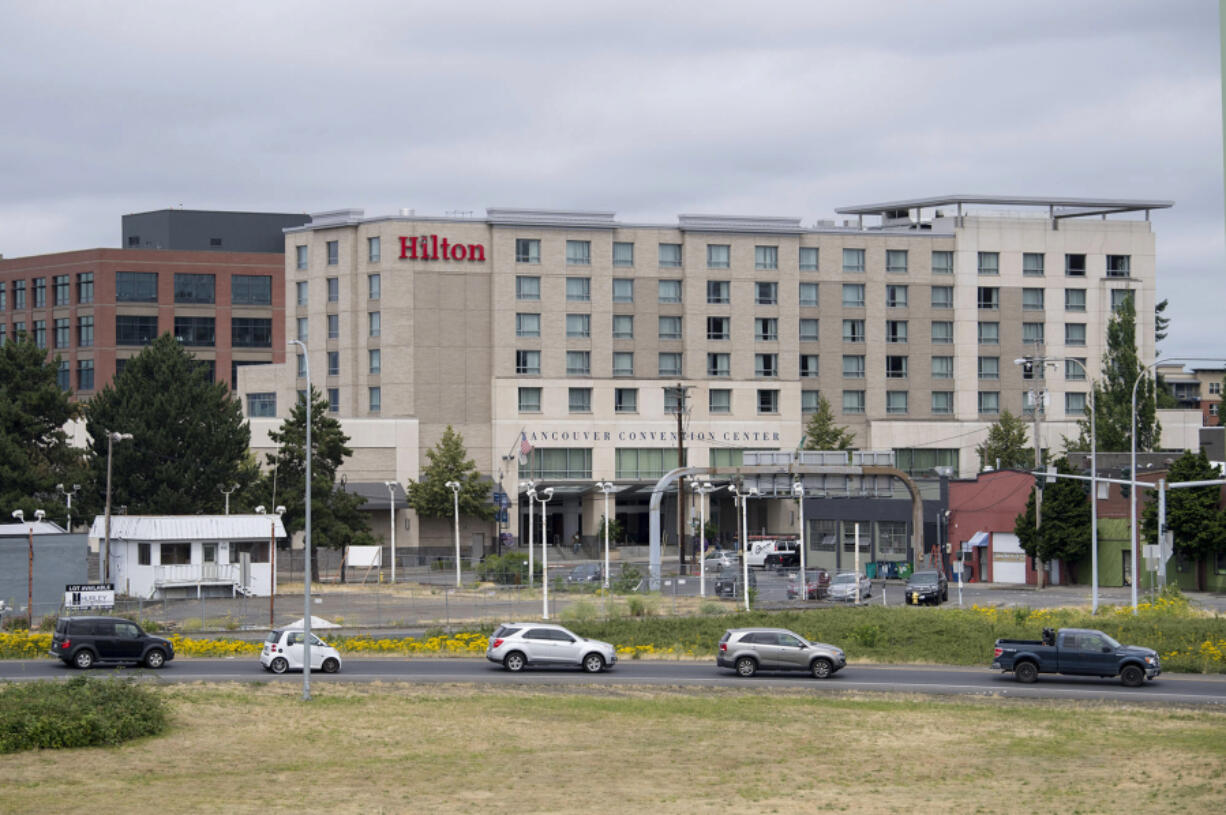 Traffic backs up as motorists prepare to approach the onramp to Interstate 5 as the Hilton Vancouver Washington conforms with the downtown landscape. With hotel developers hoping to tap into growing demand for the Columbia River waterfront, the Hilton could be joined by three more hotels by 2020.