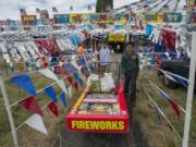 Brendon Abbott, 17, center, and Rashad Dixon, 11, push a cart full of fireworks from TNT Fireworks on the opening day of sales in unincorporated Clark County. Each Fourth of July, their household participates in a community celebration. They’re going to provide the grand finale to this year’s celebration.