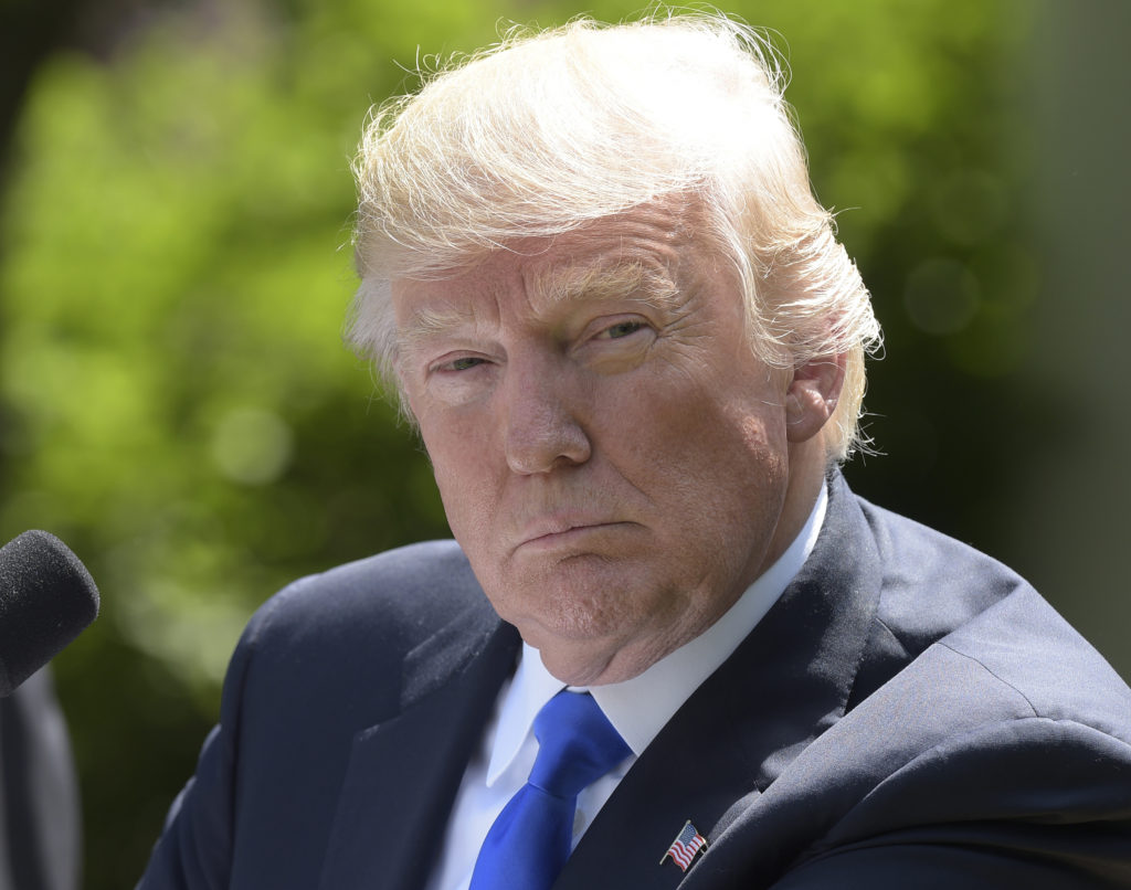 President Donald Trump listens during a news conference with Romania's President Klaus Werner Iohannis in the Rose Garden of the White House in Washington, Friday, June 9, 2017.