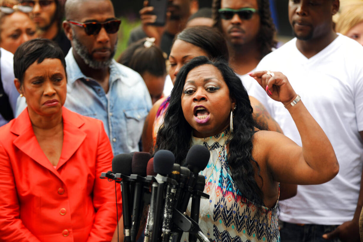 FILE - In this Friday June 16, 2017, file photo, Valerie Castile, mother of Philando Castile, a black motorist who was killed by Officer Jeronimo Yanez, speaks about her reaction to a not guilty verdict for Yanez at the Ramsey County Courthouse in St. Paul, Minn. Valerie Castile reached a nearly $3 million settlement in Philando Castile's death, announced Monday, June 26, by attorneys for Valerie Castile and the city of St. Anthony.