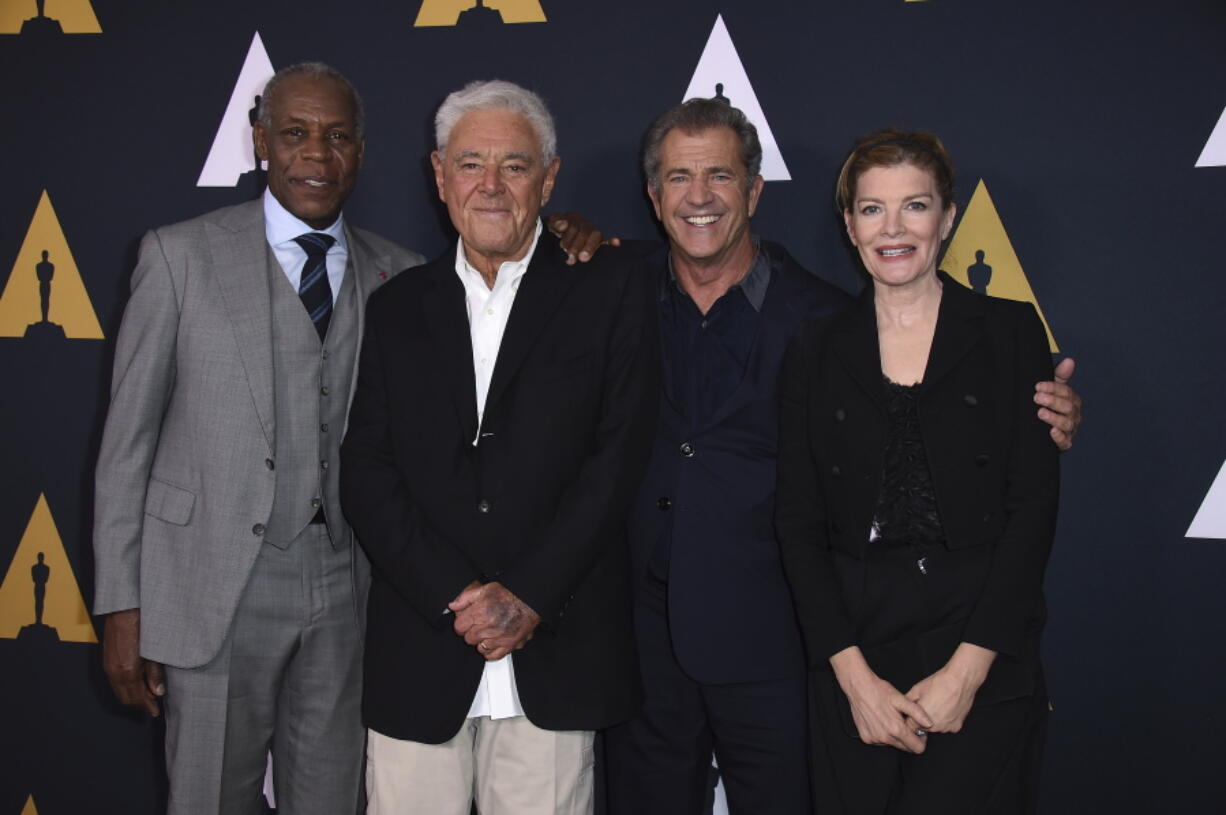 Danny Glover, from left, Richard Donner, Mel Gibson and Rene Russo arrive at the Richard Donner Tribute on Wednesday in Beverly Hills, Calif.