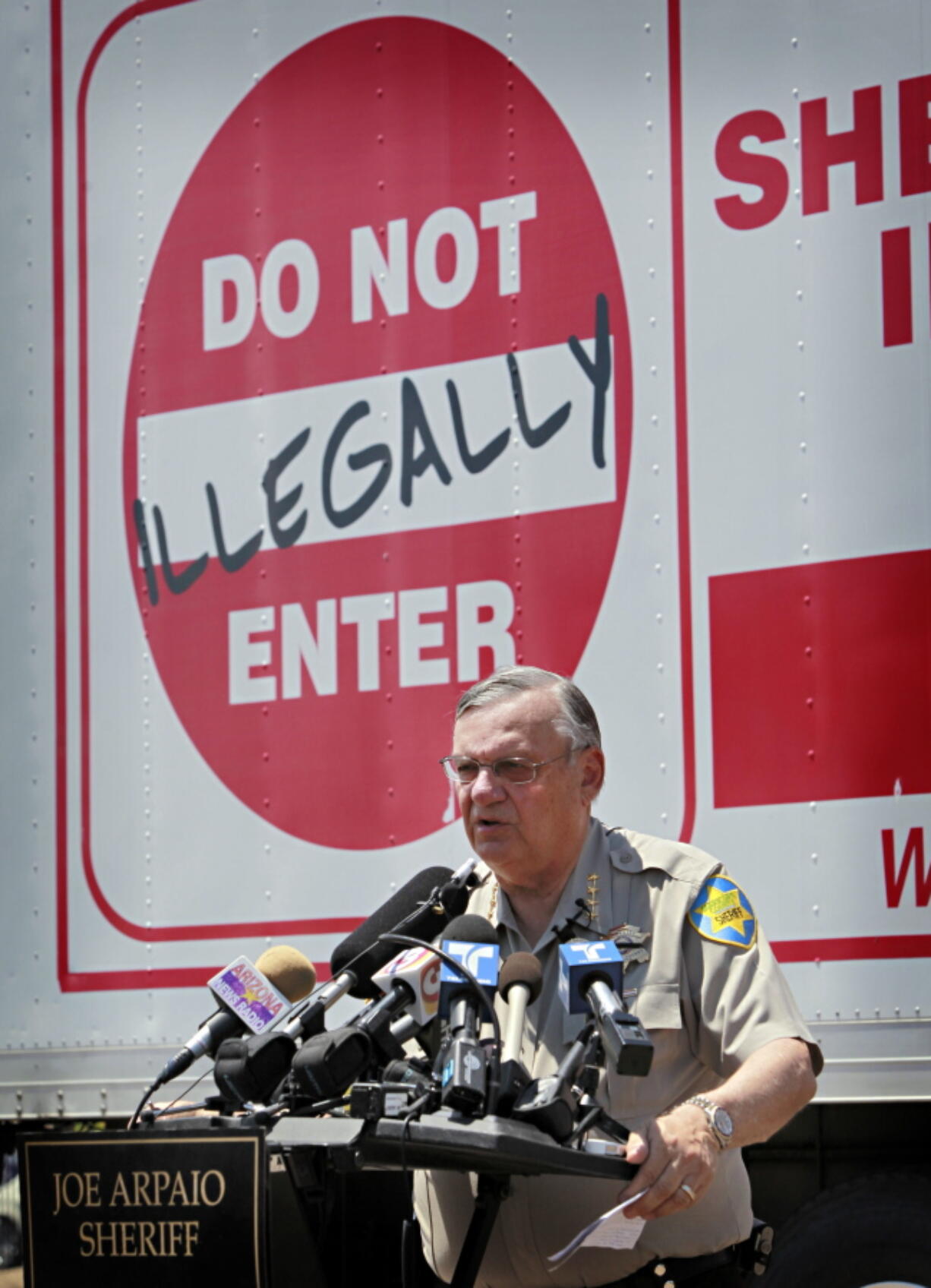 Maricopa County Sheriff Joe Arpaio speaks in Phoenix announcing his crime suppression sweeps. The former longtime sheriff of metro Phoenix will go to court Monday, June 26, 2017, to defend his reputation at a trial in which he’s charged with purposefully disobeying a judge’s order. Arpaio is charged with criminal contempt-of-court for prolonging his immigration patrols 17 months after a judge ordered them stopped.