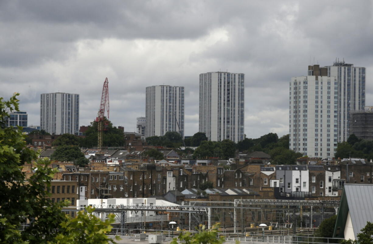 A general view of the housing towers of the Chalcots Estate in the borough of Camden, north London, Saturday June 24, 2017. Camden Borough Council said in a statement Saturday that it housed many of the residents at two temporary shelters while many others were provided hotel rooms, after inspectors found fire safety issues in housing towers, following the inferno in a west London apartment block that killed 79.