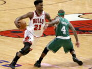 Chicago Bulls’ Jimmy Butler (21) and the 16th overall pick was traded to the Minnesota Timberwolves for Zach LaVine, Kris Dunn and the No. 7 overall draft pick.