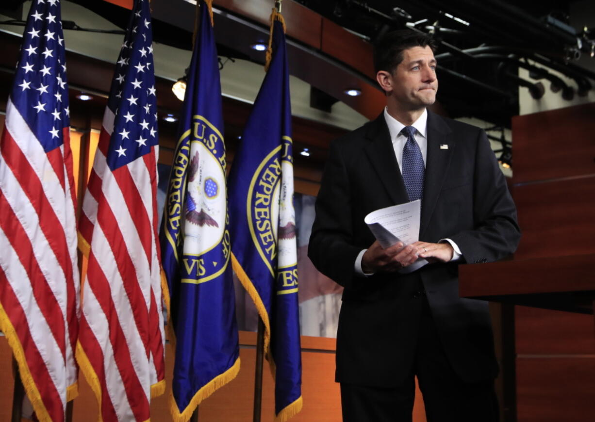 Speaker of the House Paul Ryan of Wisconsin leaves the podium as he concludes his news conference on Capitol Hill in Washington, Thursday.