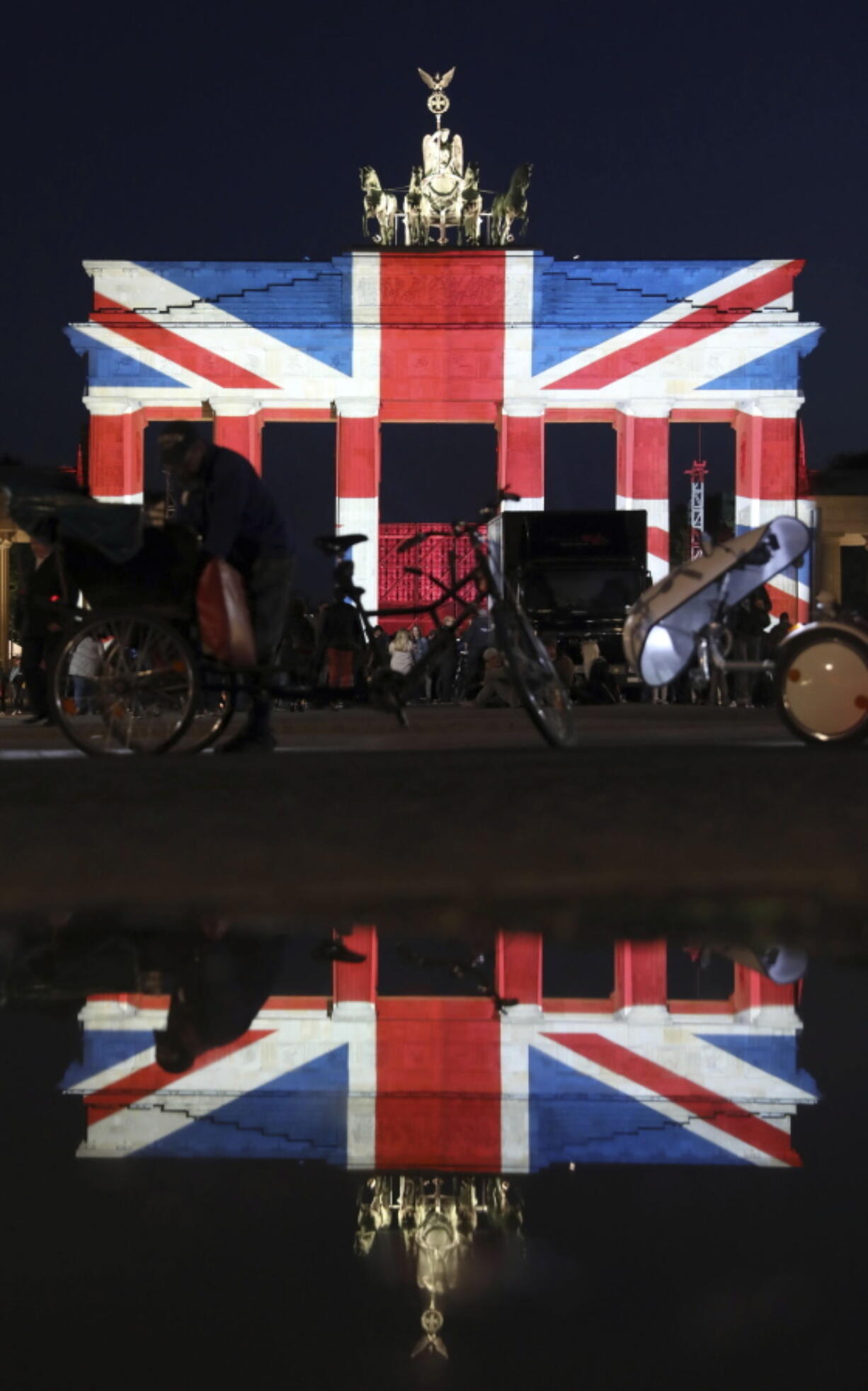 The Brandenburg Gate in Berlin is illuminated in the colors of the British union flag Sunday as a mark of respect for the people killed in the attacks in London on Saturday night.