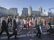 The Mormon church announced Wednesday that women who work at church headquarters in Salt Lake City can wear pants instead of only skirts or dresses.