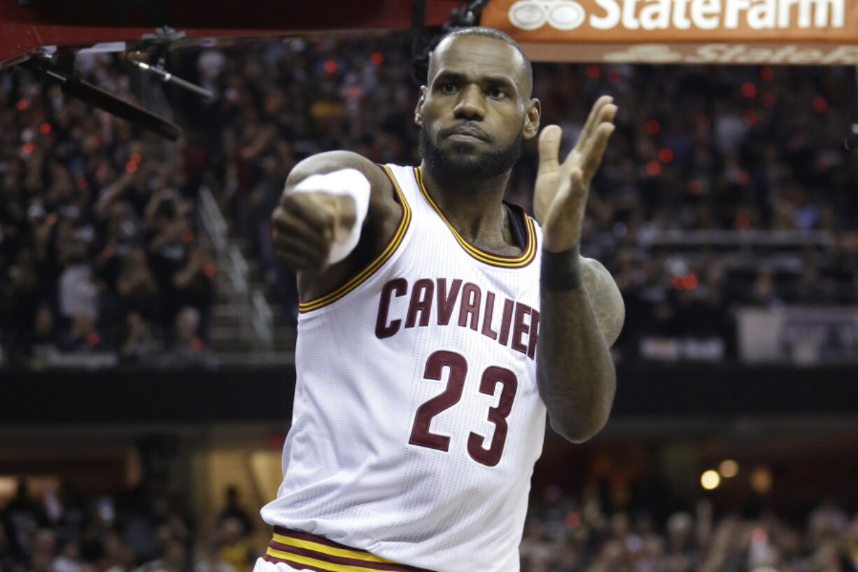 Cleveland Cavaliers forward LeBron James (23) reacts during the first half against the Golden State Warriors in Game 4 of basketball's NBA Finals in Cleveland, Friday, June 9, 2017.