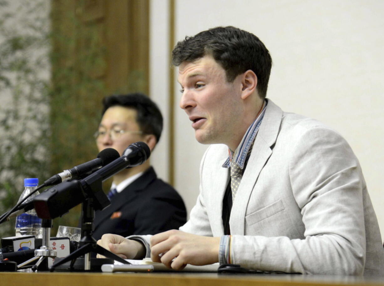 American student Otto Warmbier cries while speaking to reporters in Pyongyang, North Korea, on Feb. 29, 2016. The family of Warmbier who died days after being released from North Korea in a coma says the 22-year-old “has completed his journey home.” Warmbier died Monday, relatives said in a statement. He arrived in Ohio on June 13, 2017, after being held for more than 17 months.