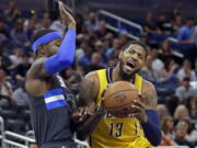 Indiana Pacers’ Paul George (13) is being traded to the Oklahoma City Thunder for Victor Oladipo and Domantas Sabonis in a stunning deal that gives MVP Russell Westbrook a new running mate.