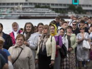 Russian Orthodox believers line up Friday to kiss the relics of Saint Nicholas that were brought from an Italian church where they have lain for 930 years, in the Christ the Savior Cathedral in Moscow, Russia. Over a million people have visited relics of Saint Nicholas, one of the Russian Orthodox Church’s most revered figures, since they were brought to Moscow last month.