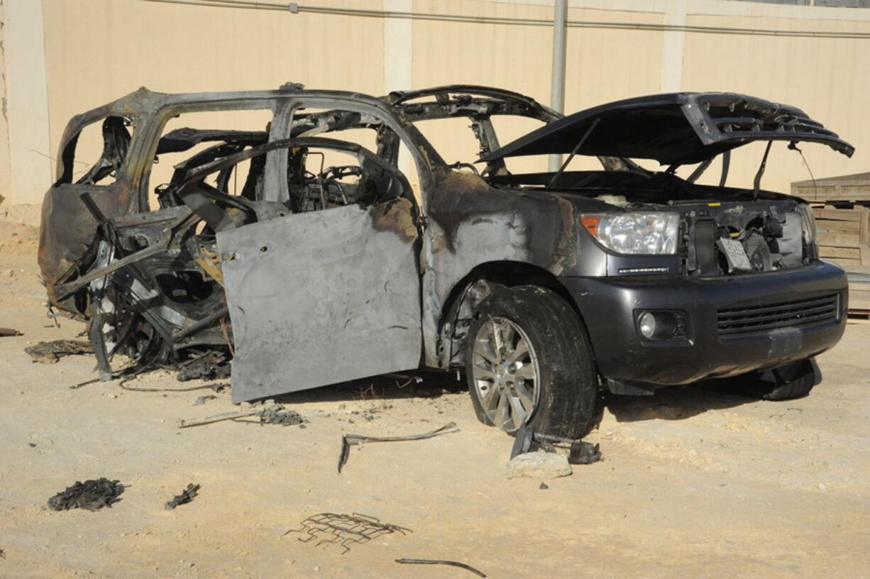 The remains of a car following action by Saudi security forces in al-Awamiya in the governorate of Qatif. The two men inside the car were killed in the explosion.