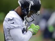 Earl Thomas said the shock of suffering a broken leg last season led him to considering retiring from football. Ted S.