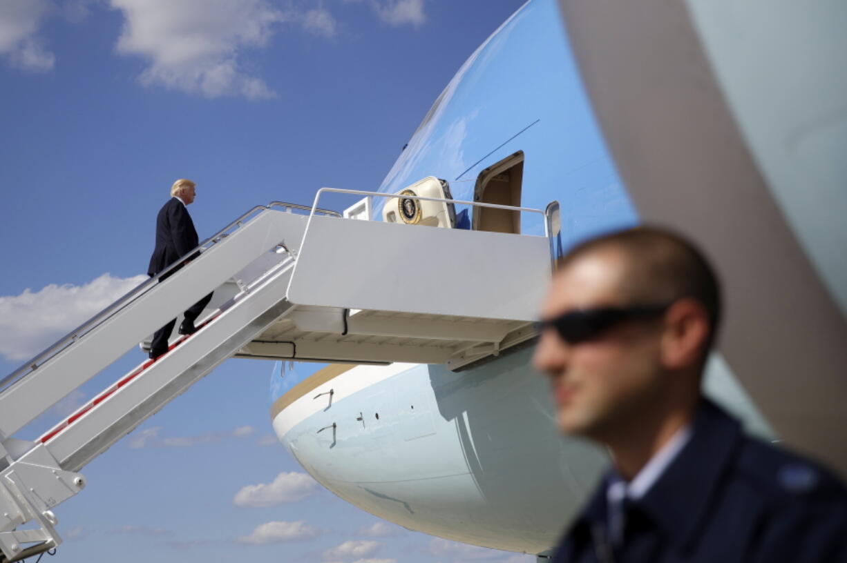 President Donald Trump boards Air Force One at Andrews Air Force Base, Md., Friday, June 9, 2017. Trump is scheduled to spend the weekend at Trump National Golf Club in Bedminster, N.J.